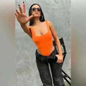 Never worn orange Lycra bodysuit